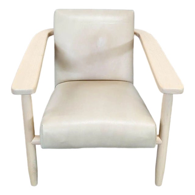 Four Hands Arnett Modern Lounge Chair With Light Wood Frame and Cream Leather Upholstery For Sale