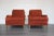 Vintage pair of upholstered club chairs These chairs are upholstered in a red chenille textile with diamond pattern...
