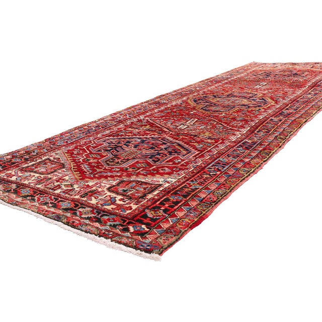 61507 Vintage Persian Heriz Rug Runner, 04'06 x 13'11. The Crimson Odyssey: A Vintage Persian Heriz Masterpiece of...