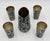 Exceptional 1960s Mexican Modernist barware set comprising a large water or beverage pitcher and four matching tumblers,...