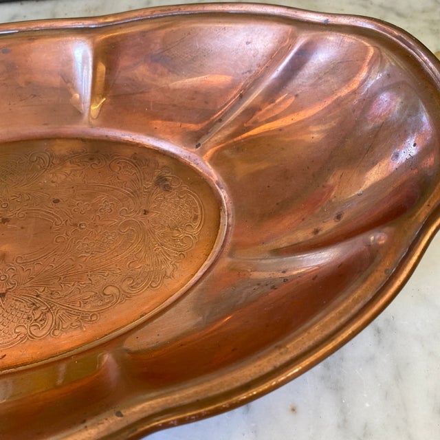Beautiful oblong copper catchall dish. Perfect for any tabletop space and for the interior designer.