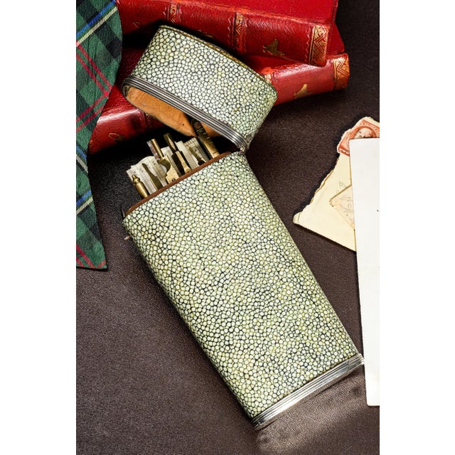 Discover the artistry and precision of the 18th century with this remarkable set of brass drawing instruments, accompanied...