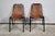 Pair of chairs according to the work of Charlotte Perriand (1903-1999) for the Savoyard ski resort. Perriand is a French...