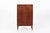 This vintage mid-century Danish modern teak secretary desk or bar cabinet was made in Denmark in the 1960s. The cabinet...