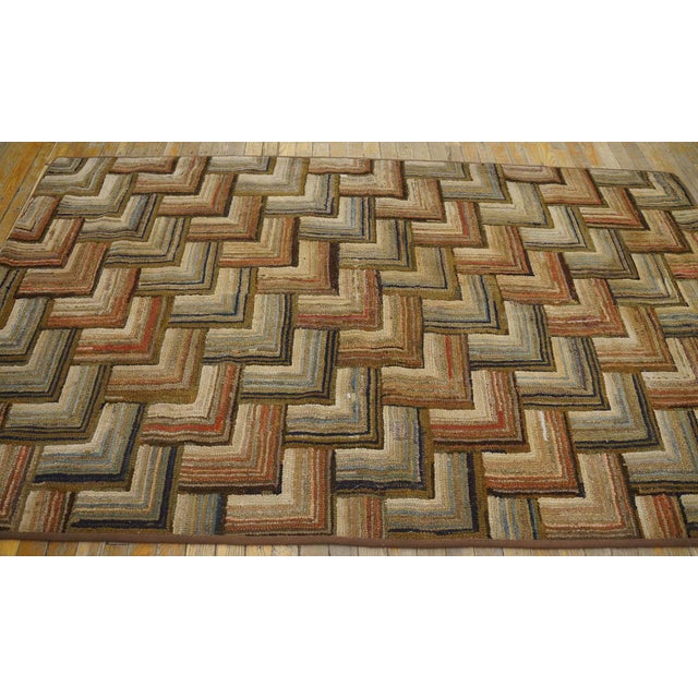 Antique American Hooked rug. Size: 4'3" x 7'2" American Small Scatter Size Hooked Wool 1890s Antique Rug, Country of...