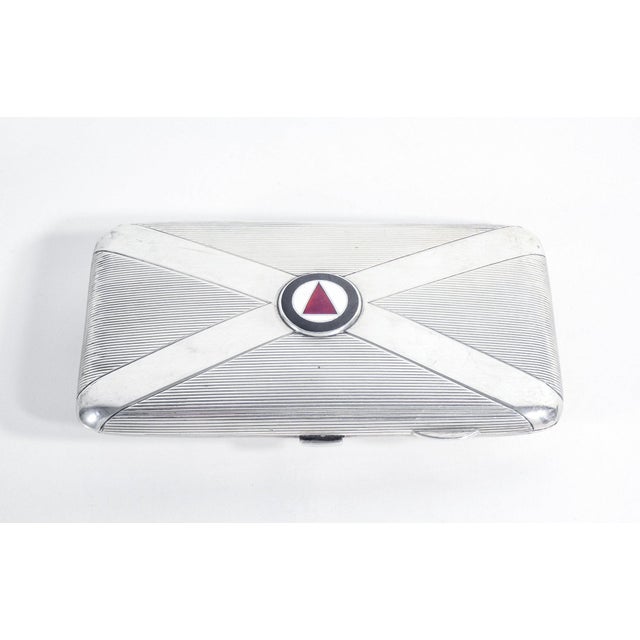 Sterling silver cigarette case, with dedication and the coats of arms of the northumberland fusiliers and the 15th...