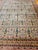 Early 20th-century Indian Agra room size rug featuring an allover “Tree of Life” pattern, inspired by the classical motifs...