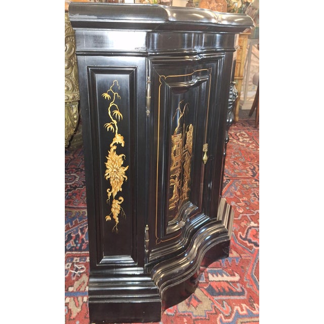 It has the karges label inside one of the drawers as will as the fabric inside for storing silver. It has the original...