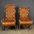 Mid 20th Century British made pair of tan leather rocking chairs, howing superb patina and colour, this wonderful pair of...