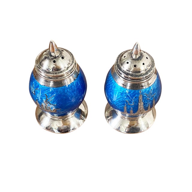 Superb pair of vintage Siam sterling silver salt and pepper shakers, each standing 2.75 inches tall with a 1.5-inch...