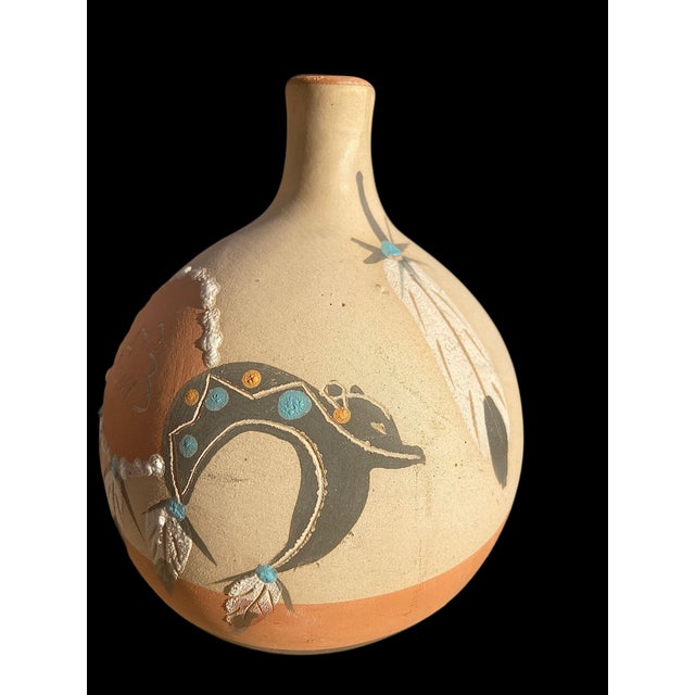 The 1989 VTG Southwestern Pueblo Pottery Styled Vase by Betty Selby is a stunning piece of Native American art. Handmade...