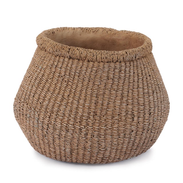 Elevate your home décor with the rustic charm of this Braided Weave Cement Container. Designed to resemble thick, hand-...