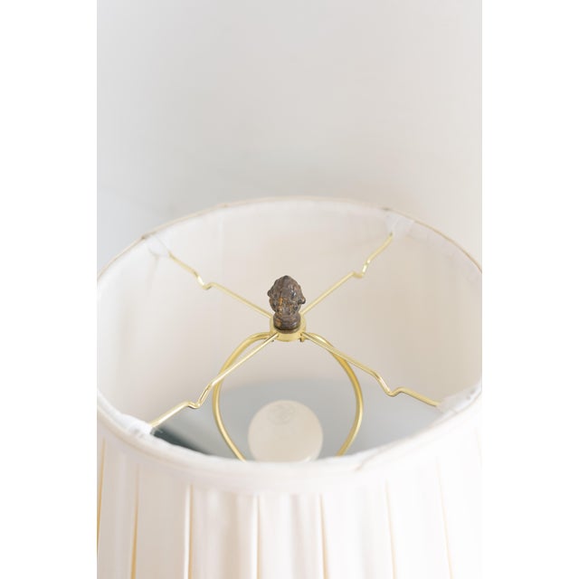 A wonderfully understated antique pottery table lamp, featuring a richly patinated earthenware vessel with warm, timeworn...