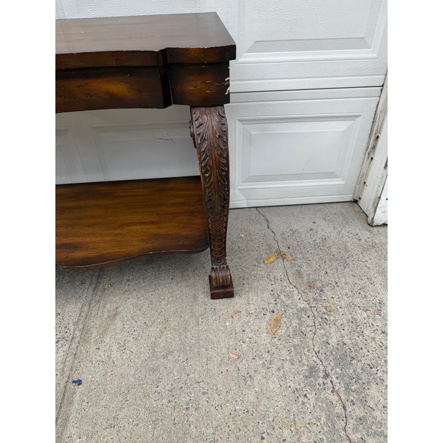 Vintage Neoclassical Revival Console Table With Ornately Carved Scroll Supports and Lower Shelf For Sale - Image 9 of 12
