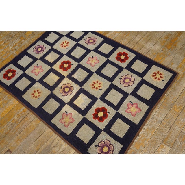 Antique American hooked rug, size: 2'8" x 3'8".
