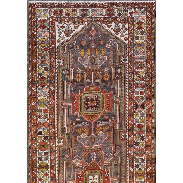 Tribal Antique Persian Bakhtiar Gallery Rug Featuring a Multi-Medallion Tribal Design For Sale - Image 3 of 16