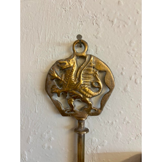 A most excellent vintage brass shoe horn. Beautifully detailed dragon representation at the top - the national symbol of...