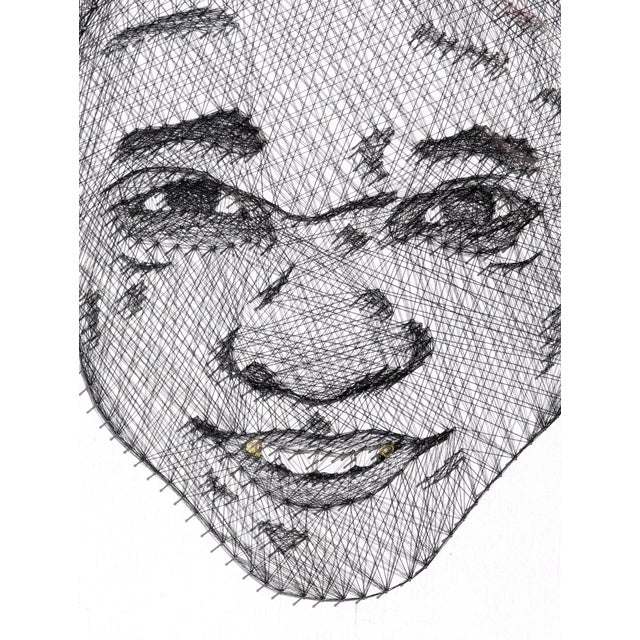 Contemporary black and white mixed media portrait by Houston-based artist Jaymes Earl. The work features an abstract...
