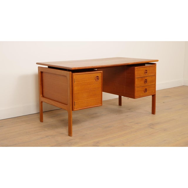 Vintage teak desk from the 1960s, designed by renowned danish designer arne vodder for gv møbler. elegant freestanding...