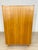 For sale is this beautiful, two-door wardrobe made of light wood with slightly splayed legs, as seen in the attached...