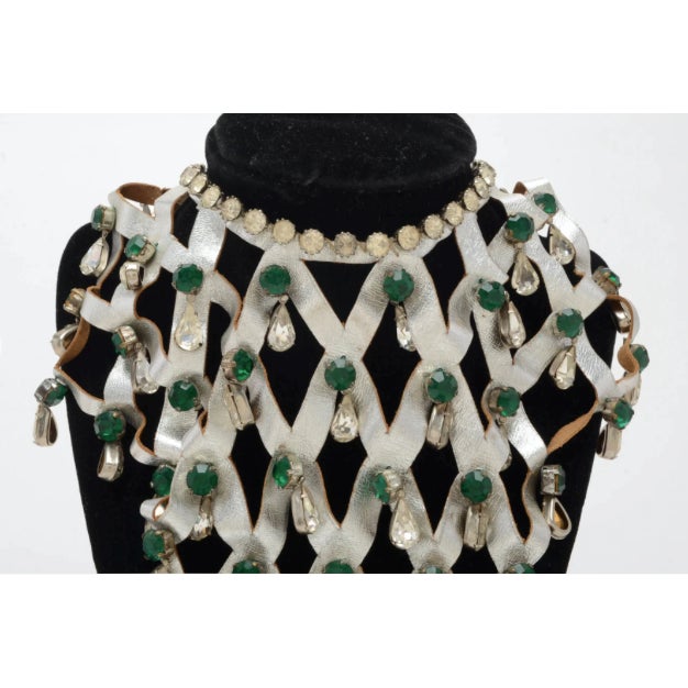 Stunning vintage Lee Menichetti rhinestone collar necklace. The base is silver toned leather cut in a lattice design which...