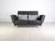 We are offering a beautiful Brühl Moule two-seater in black for sale. This piece impresses with its versatile use and...