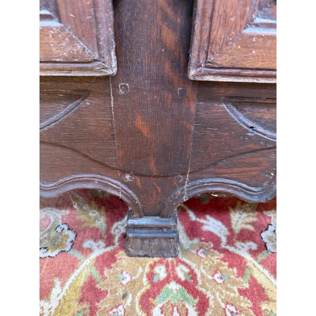 Large Louis XV style sideboard in solid oak and veneer. It features four drawers in the upper section adorned with...