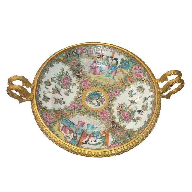 An exceptional late 19th century French gilt bronze–mounted Chinese Famille Rose porcelain centerpiece bowl of refined...