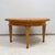 Wood French Circular Coffee Table in Oak on Tapered Legs Ending in Brass Sabots For Sale - Image 7 of 7