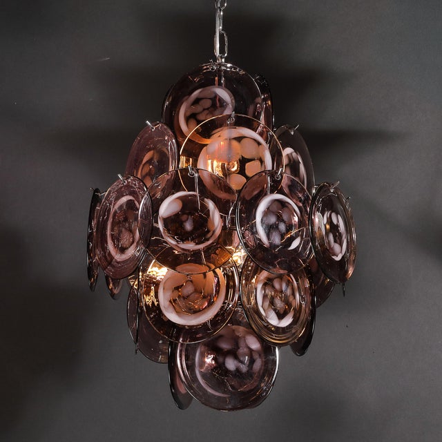A dazzling Modernist five-tier chandelier, superbly crafted from hand-blown Murano glass, Italy, circa 1980. This...