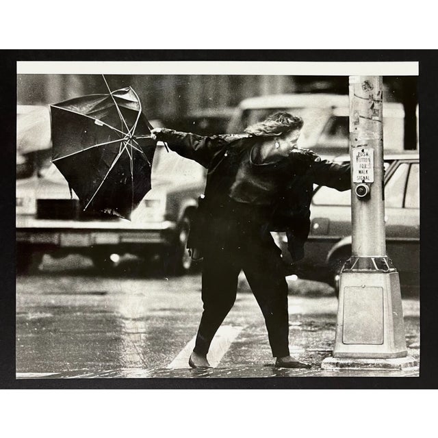 1988 black and white photograph by Steven Labadessa of a windy day outside Hancock Tower in Boston at the coroner of...