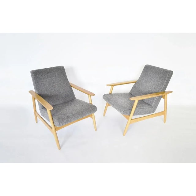 This pair of Ąžuolas Armchairs were designed in 1960s by legendary lithuanian modernist architect Valerija Ema...