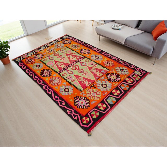This authentic vintage Turkish kilim was handwoven in the 1950s by villagers in Ordu, located in Northern Turkey....