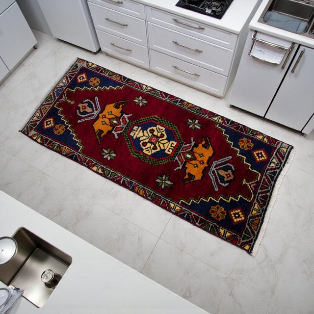 This hand-knotted Konya Yastik rug is a masterful representation of mid-century Anatolian weaving, showcasing a vibrant...