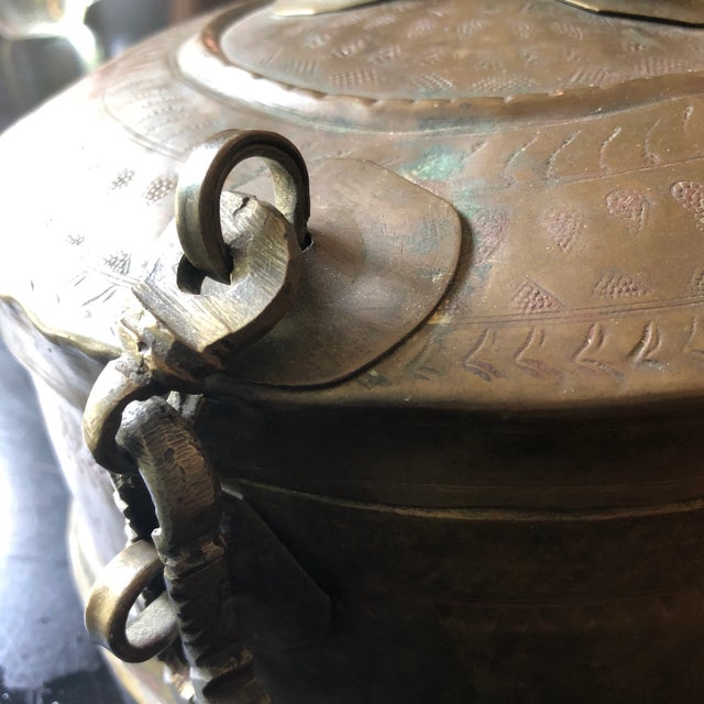 Beautiful antique hand hammered brass box with latch. Has hammered floral details. Perfect for the interior designer....