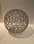 From the 1960’s, this pair of wire spheres were meticulously created by the artist by soldering each “circle”...
