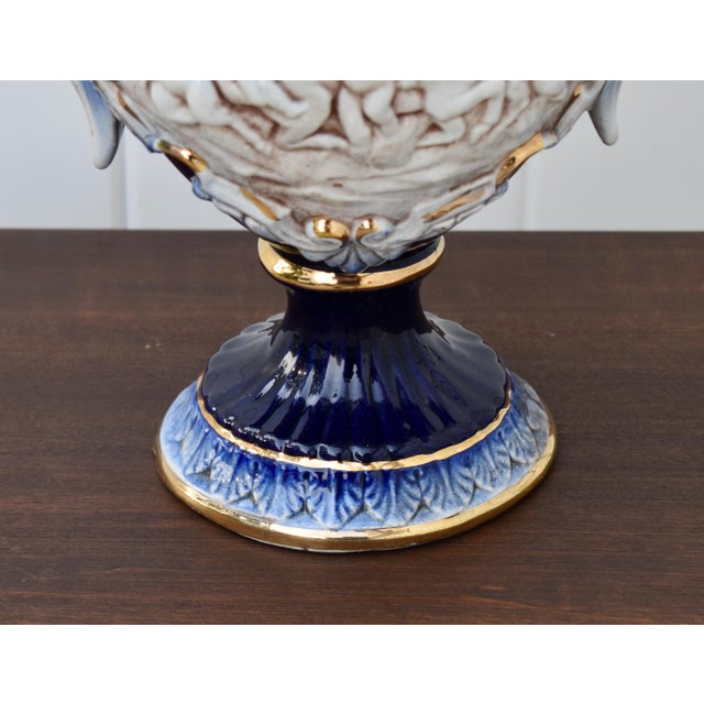 Vintage (1970's) Urn with Lid has a Italian Capodimonte Style. Made of Ceramic. Cobalt Blue and Cream. Made in Italy. The...