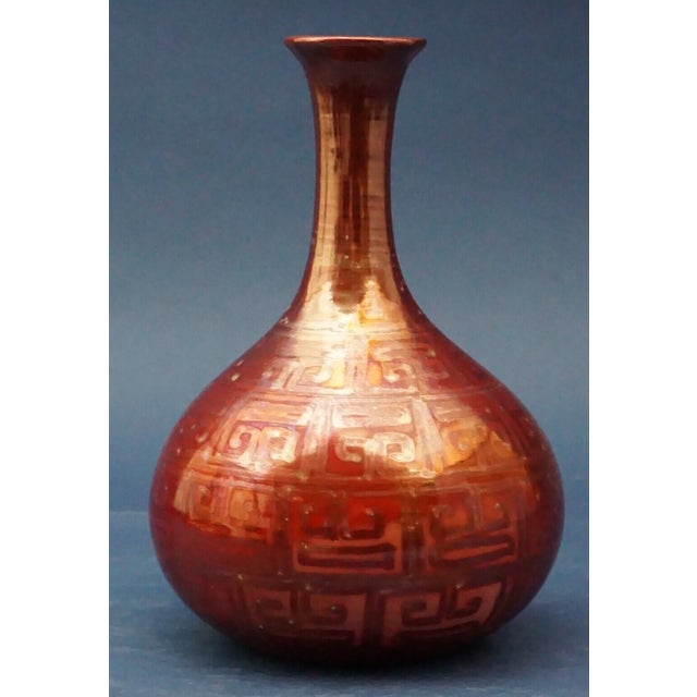 Beautiful, rare ceramic ampoule vase, entirely airbrushed and finished with a metallic lustre. Made by the renowned Faenza...