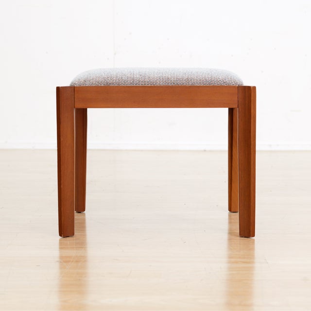 Mid century modern teak vanity stool / bench featuring clean Scandinavian-inspired lines and a beautifully minimal...