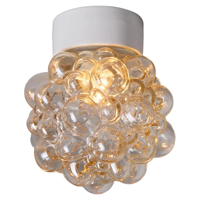 Helena Tynell Amber Bubble Glass Wall or Ceiling Lamp. Executed in thick and heavy textured light amber bubble glass and...
