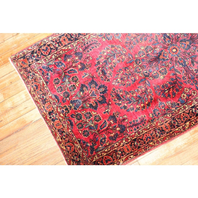 An early 20th century traditional Persian Sarouk rug Measures: 2'6'' x 4'10”. .