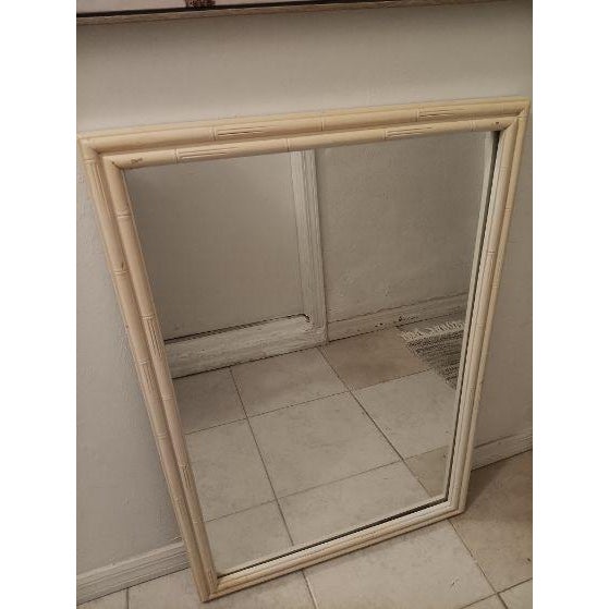 Hollywood Regency wall mirror ivory color Style: Hollywood Regency Color: Ivory Dimensions: 27" W x 39" H x 1"1/2 D