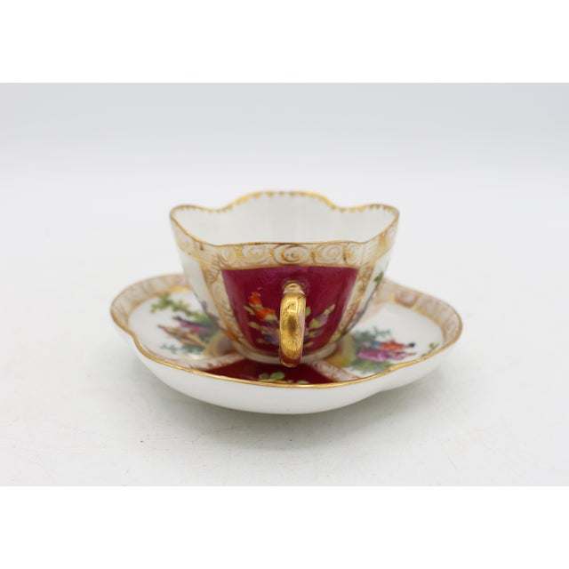 Circa 1888-1916 Richard Klemm, Dresden quatrefoil demitasse cup & saucer. Fully marked. Porcelain. Delicate scroll handle....
