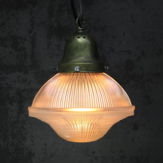 Glass pendant lamp by holophane, usa. 1950s brass top, glass holder black cotton wire. e27 / e26 this piece has an...