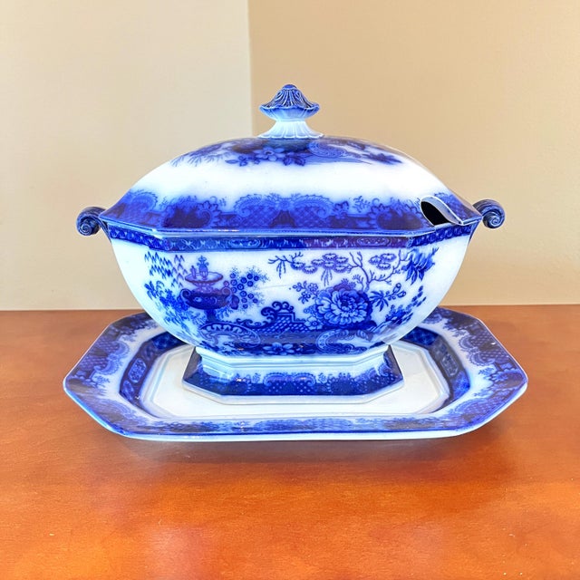 Antique Flow Blue soup tureen with lid and platter. Flow Blue pieces are so named for the way the cobalt blue ink bleeds a...