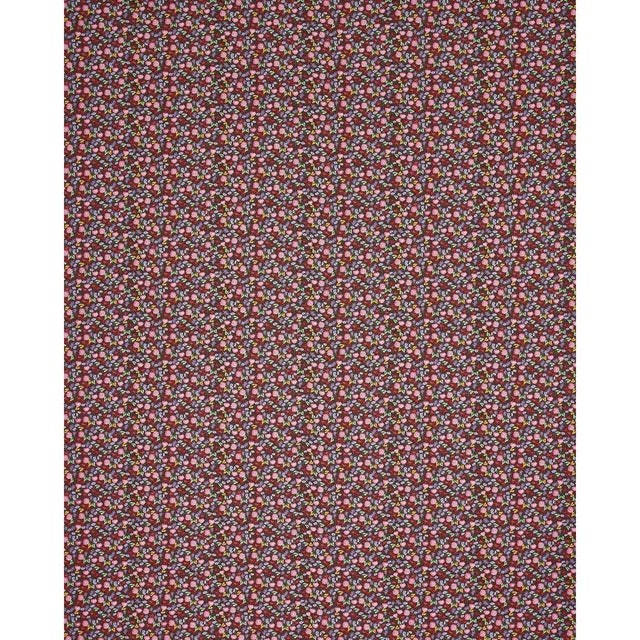 "Happy Menocal’s microfloral fabric offers a fresh take on a traditional calico. With its charming, stylized flowers...