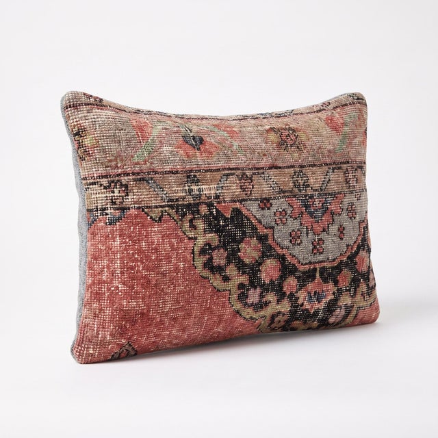 This beautiful 16'' x 24'' pillow cover was made from an authentic Turkish rug. Bright colors of wool adorn the front of...