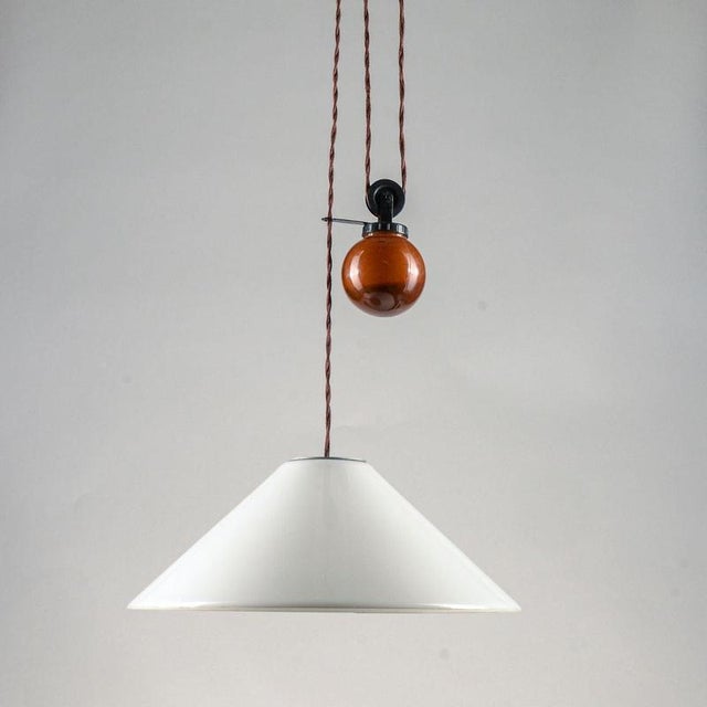 This postmodern pendant lamp, designed by Enzo Mari and Giancarlo Fassina for Artemide in 1970, is an icon of Italian...