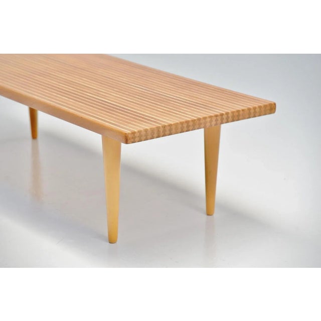 Stunning crafted coffee table designed by Yngvar Sandstrom and manufactured by Nordiska Kompaniet, Sweden 1955. The table...