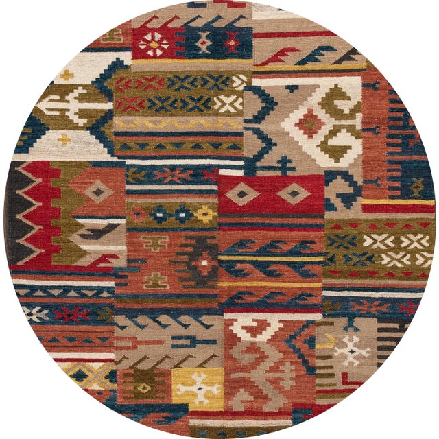 A beautiful hand-woven modern Kilim rug with a tan field and multi-color accents in an all-over geometric design. This rug...